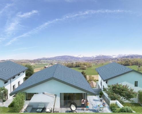 Vue sur 3 3 maisons avec grandes terrasse dont une est occupée par une famille, salon extérieur à l'avant plan et paysage de montagnes en arrière plan