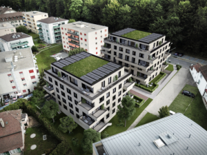 Vue aériene de synthèse sur deux immeubles en projet à Lausanne avec panneau solaires et végétaux en toiture