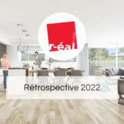 Image de titre concernant la rétrospective 2022. Logo R-éal Suisse SA en haut et image d'un séjour moderne et lumineux en fond